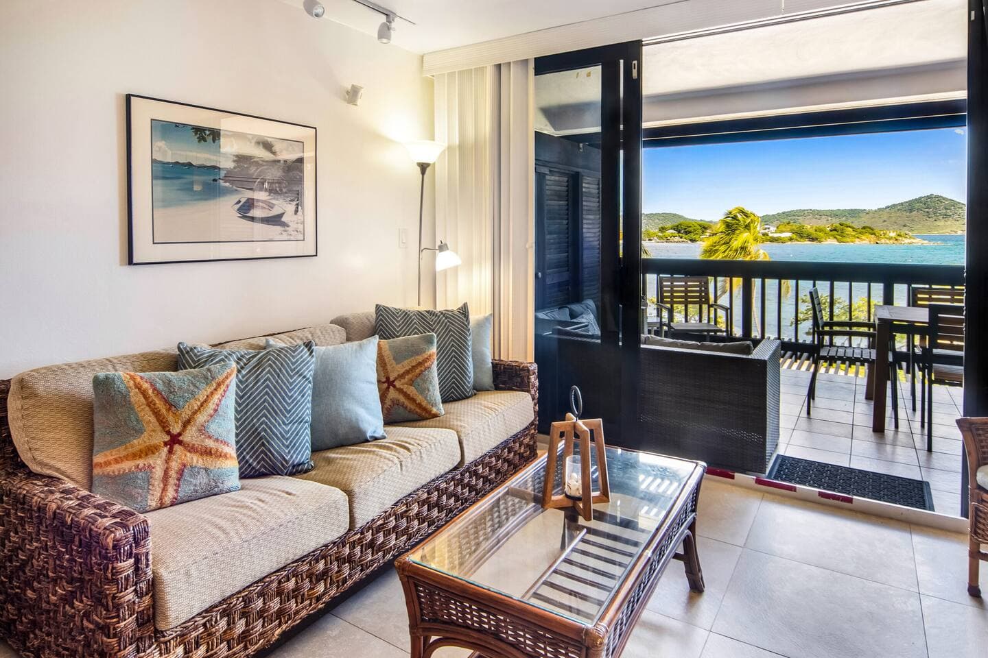 Sapphire Beach villa living room opening to a turquoise bay